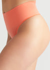 Ultralight Shaping Thong - Seamless from Yummie in Peach Echo - 1